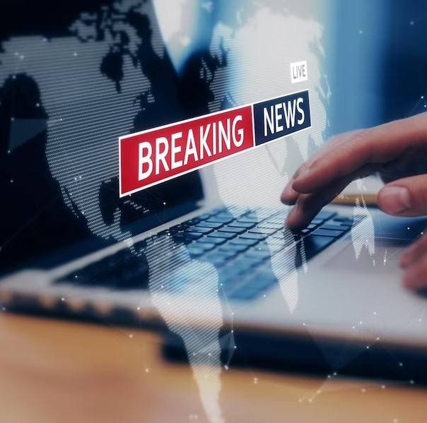 digital-internet-news-concept-with-virtual-breaking-news-screensaver-world-map-man-hands-using-laptop-background_670147-73