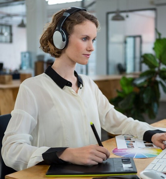 female-graphic-designer-working-desk_107420-88824